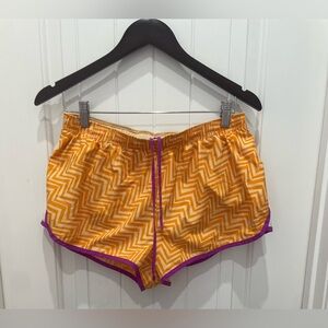 Nike Women's Orange Chevron Athletic Shorts with Purple Trim
